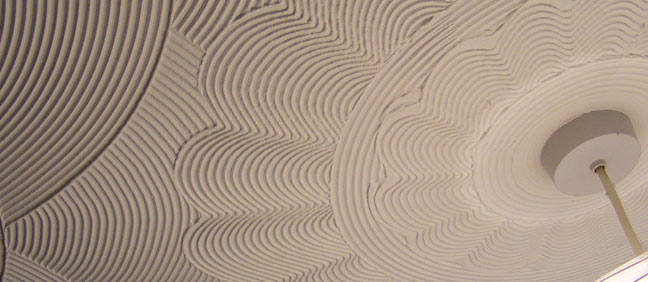 Làm thế nào để sơn tường có trát vữa hoặc có hoa văn?