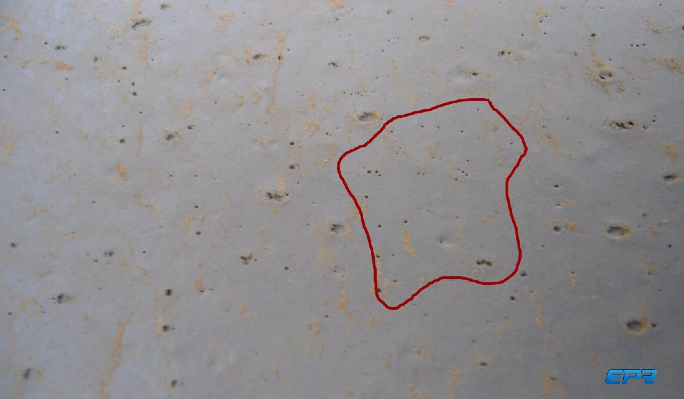 Sơn tường bị lỗ kim